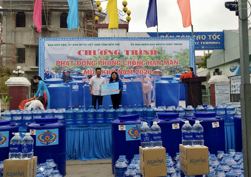 Le Ngoc An, Suntory PepsiCo Vietnam's senior director of sales in the Mekong Delta region, gifts 40,000 liters of bottled water to residents in Ben Tre Province, Vietnam, March 9, 2020.