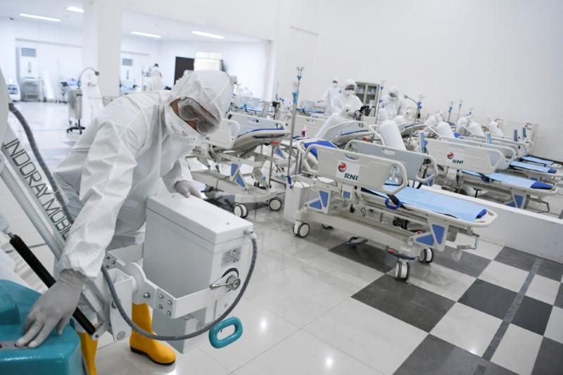Indonesia's health system on the brink as coronavirus surge looms