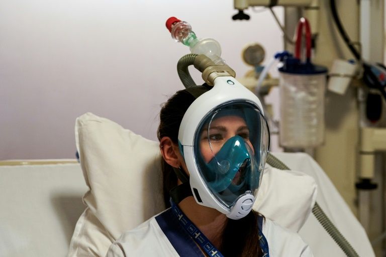 Hospitals turn to snorkel masks to ease respirator overload