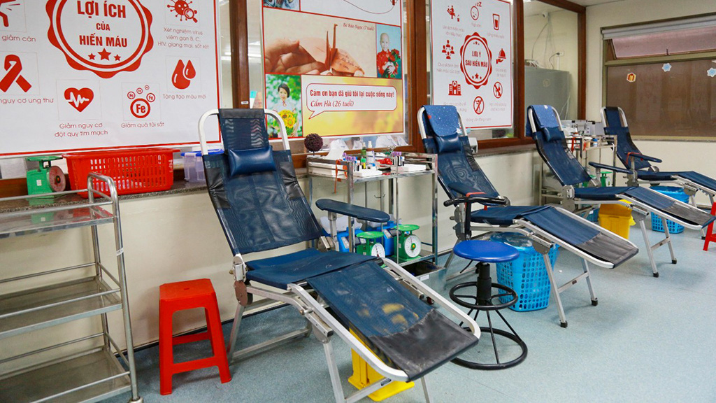 Empty reclining chairs in the admission room of the Hanoi-based National Institute of Hematology and Blood Transfusion are seen in this provided photo.