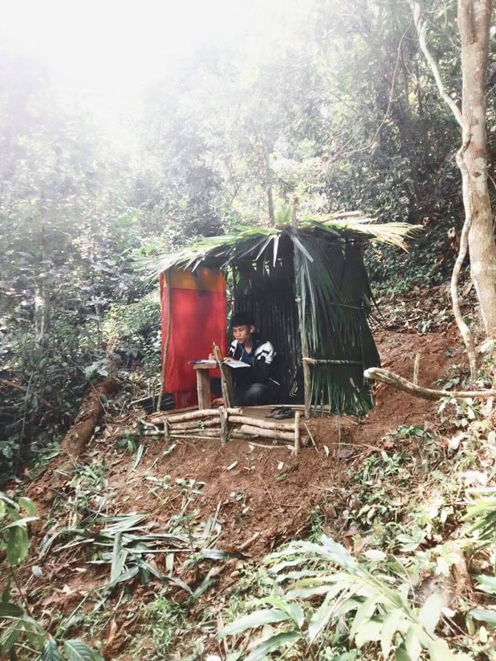 As Internet connection is unstable in his house, 10th grader Quang The Ha builds a makeshift tent on top of a hill which is a ten-minute walk from home to join online classes.