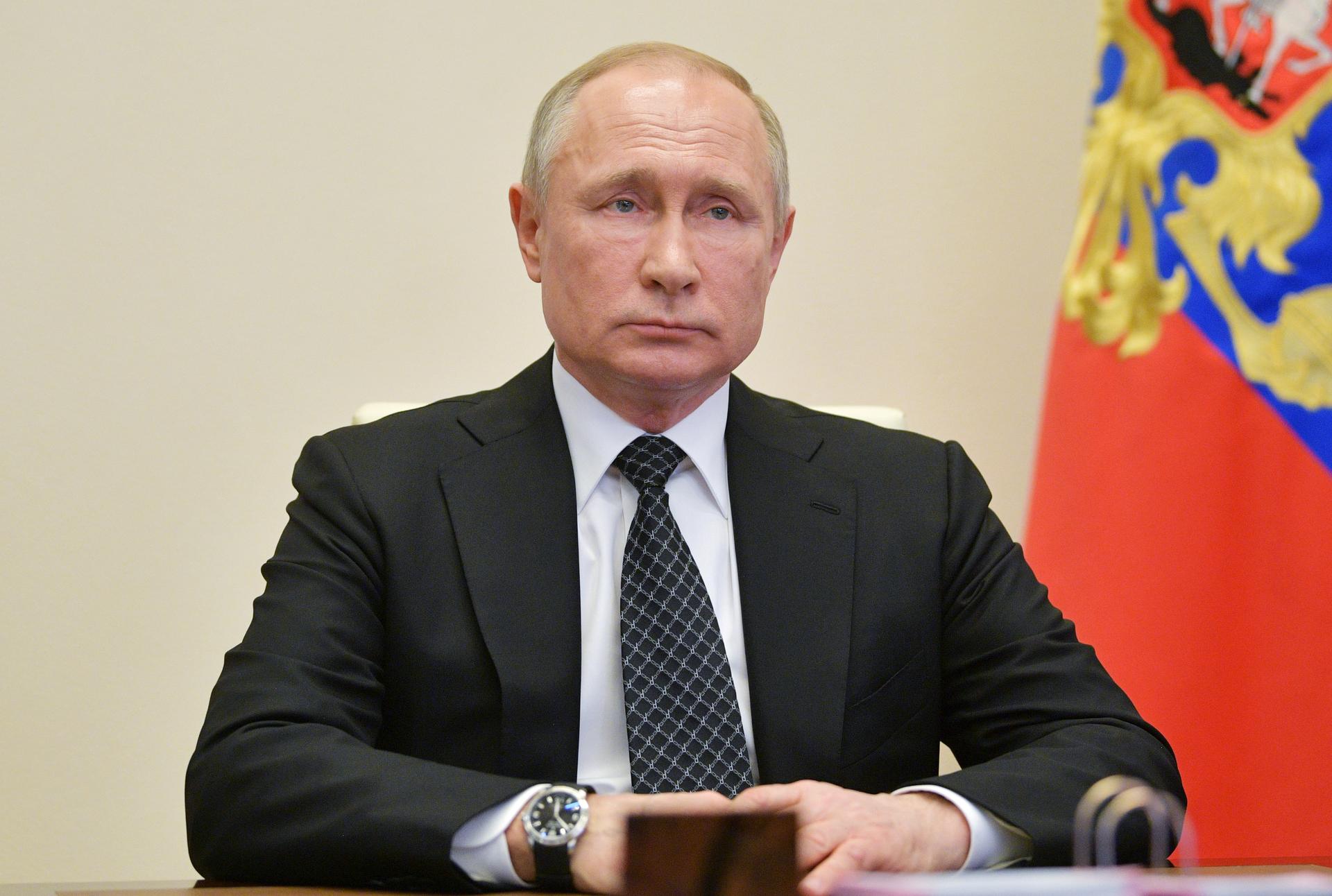 Putin says coronavirus crisis under full control despite record rise in cases