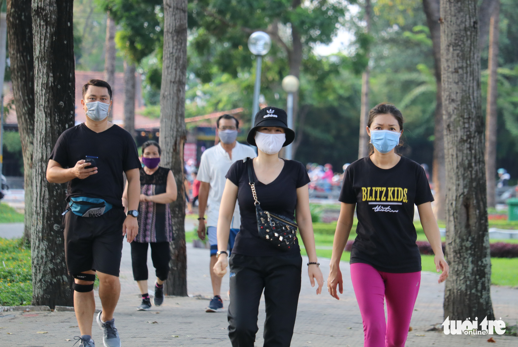 Joggers trailing Gia Dinh Park in Ho Chi Minh City, Vietnam, April 23, 2020. Photo: Ngoc Phuong / Tuoi Tre