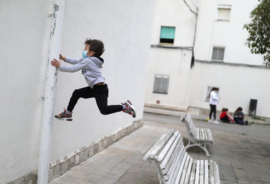 'Air on your face': Spanish children get outside for first time in six weeks