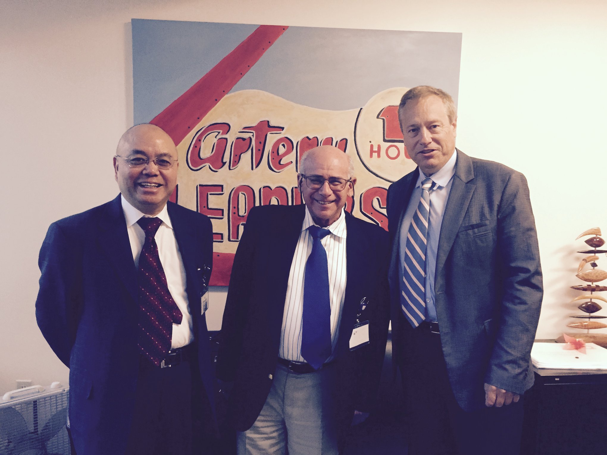 Prof. Thach Nguyen (left), Steven Korn, and Prof. Michael Gibson at Gibson's office in Boston.