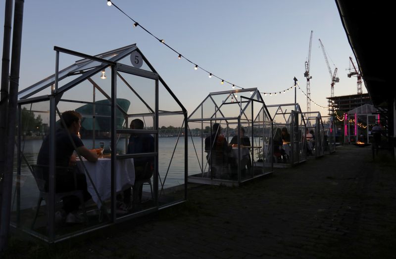 'Quarantine greenhouses' are being tested in which guests can dine at a restaurant in Amsterdam. Photo: Reuters