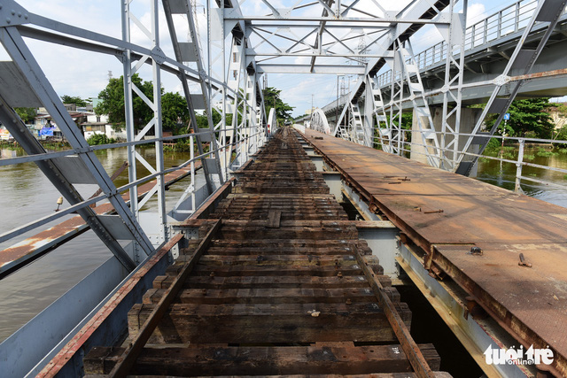 A part of the old Binh Loi Railway Bridge in Ho Chi Minh City, Vietnam is seen dismantled in this photo taken on May 8, 2020. Photo: Quang Dinh / Tuoi Tre