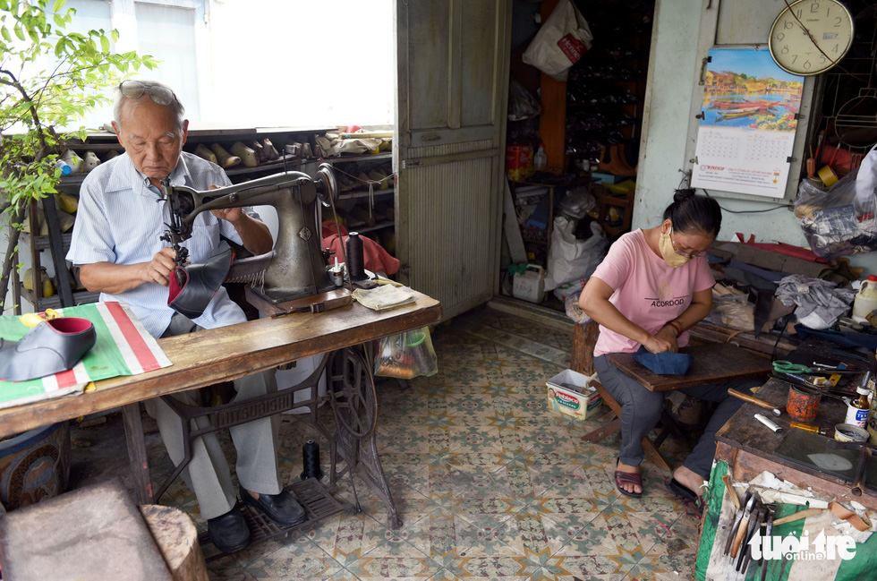 Ngoc is seen making shoes on the fourth floor of his house in Ho Chi Minh City, Vietnam. Photo: Duyen Phan/ Tuoi Tre