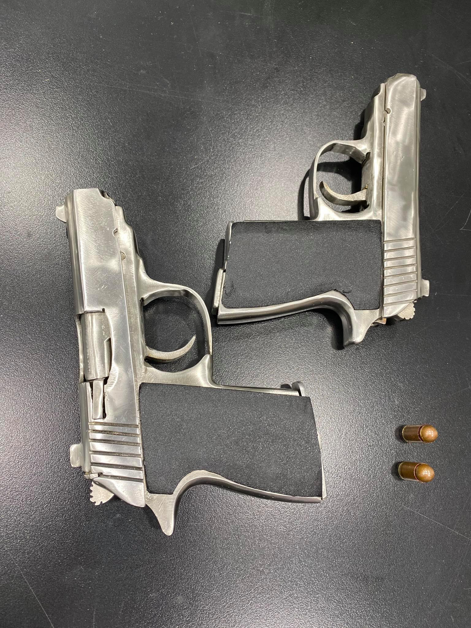Two pistols confiscated from an illegal firearms-manufacturing facility in Hai Phong City, Vietnam are seen in a supplied photo.