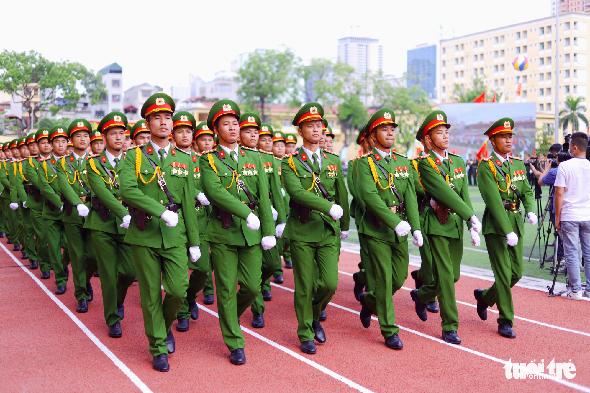 Police officers march during the opening ceremony of the ‘Stay Fit for National Security’ Campaign in Hanoi, August 1, 2020. Photo: Danh Trong / Tuoi Tre