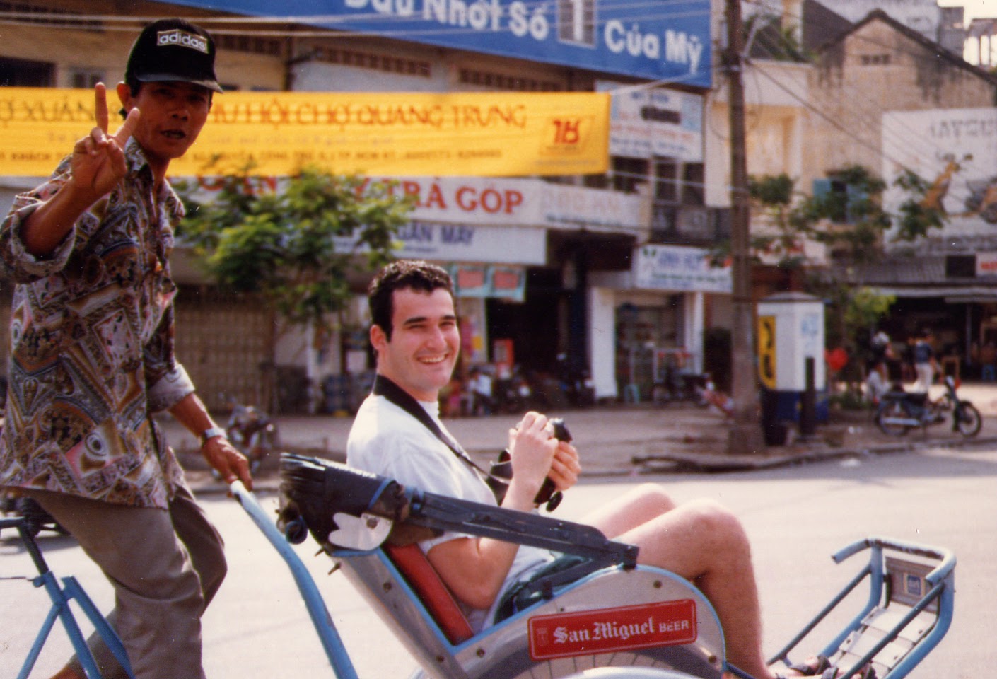Kyle Nunas poses while sitting on a cycle during his first trip to Vietnam as a tourist in 1997. Photo: Supplied