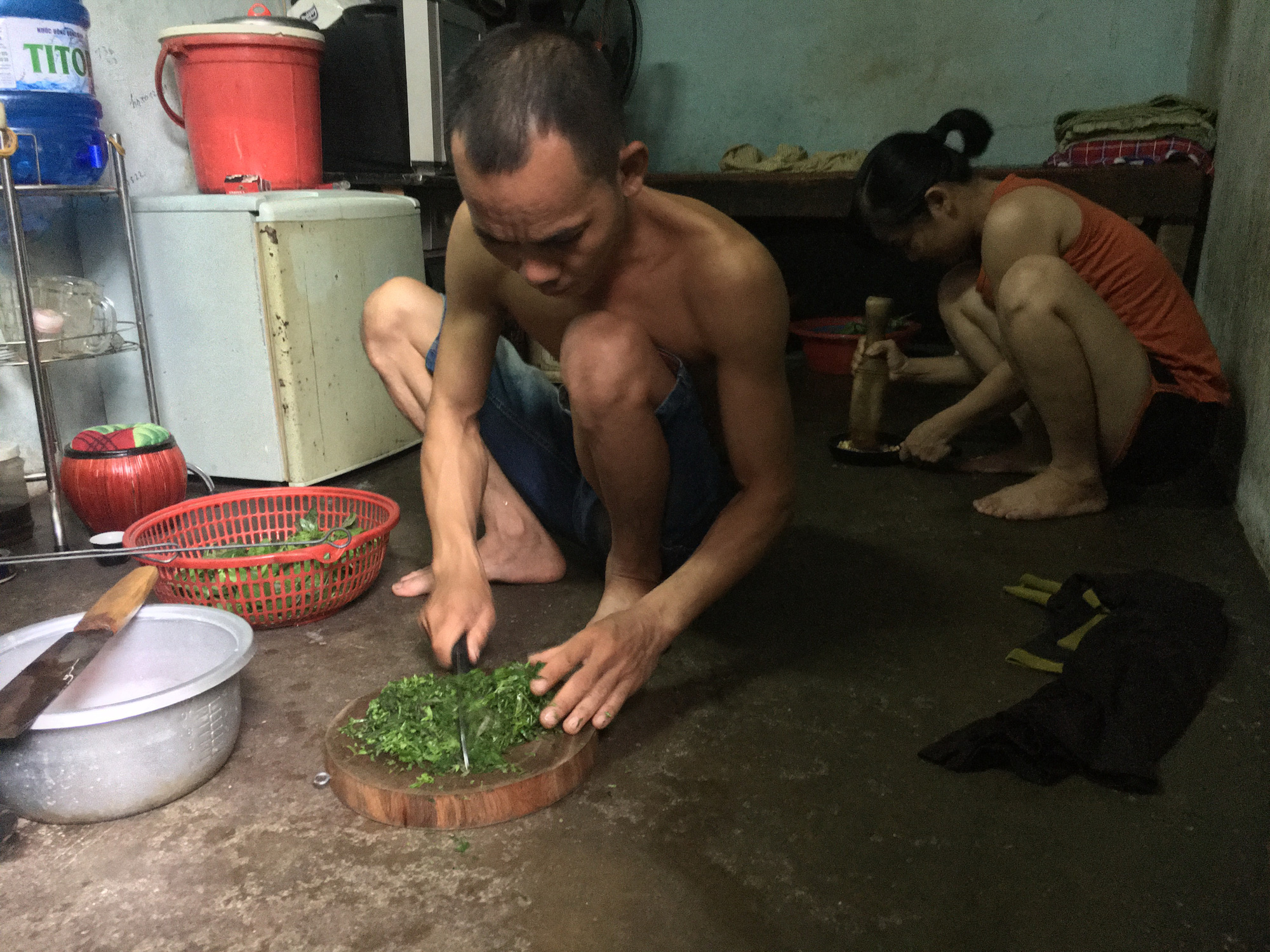 Saigon’s riverside residents make ends meet selling scrap