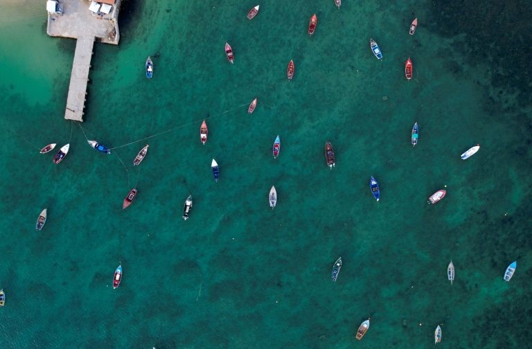 An aerial view shows fisher boats at the harbor in Sal Rei at Boa Vista island, Cape Verde, on January 06, 2020. Photo: AFP