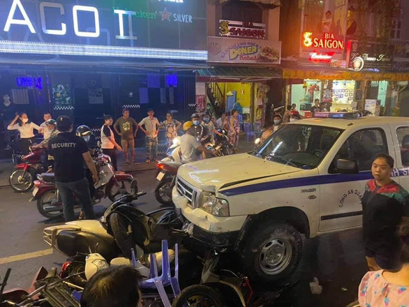 Police car plows into people, vehicles in Ho Chi Minh City's 'backpacker area'