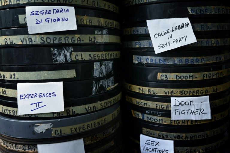 A view taken on August 26, 2020 shows film reels stored at the 'Ambasciatori' (The Ambassadors), Rome's last porn cinema theater. Photo: AFP