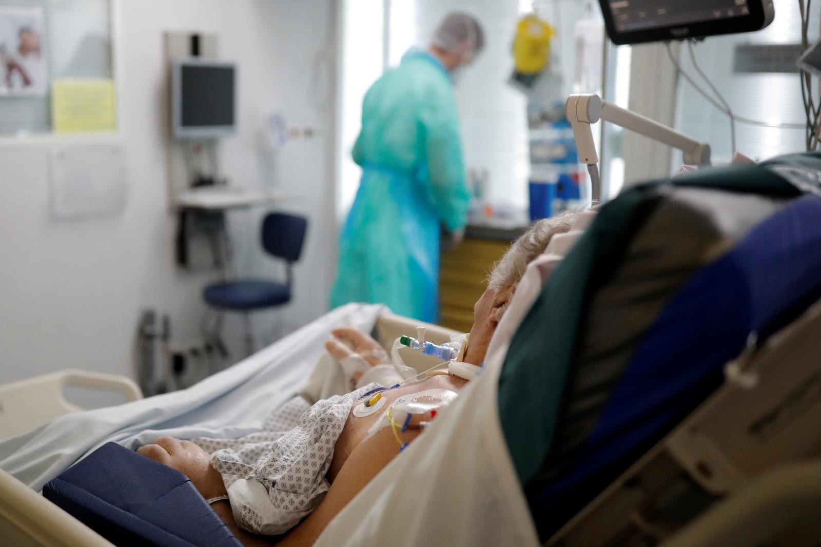Hospitalizations rise as France's daily COVID-19 cases hit record