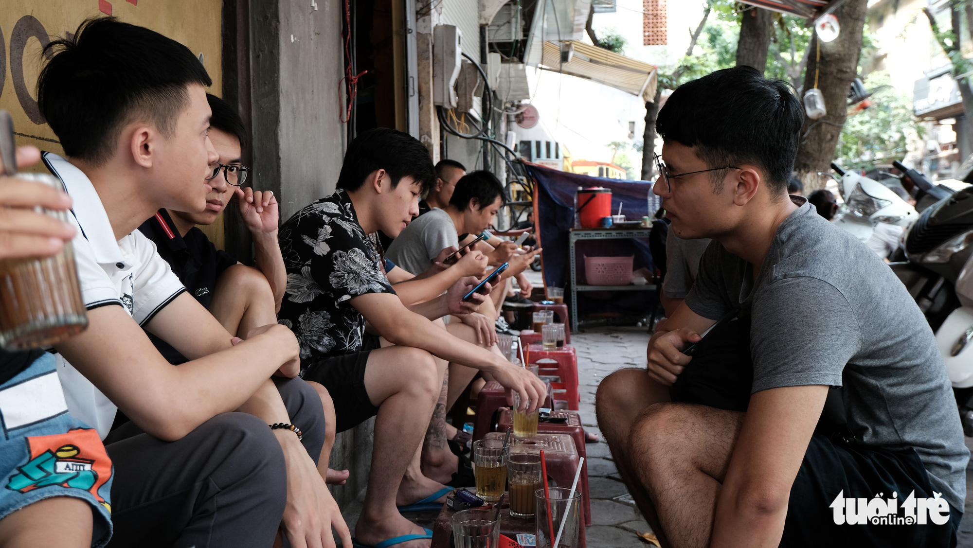 Customers enjoy coffee and chitchat at Thai Café on Trieu Viet Vuong Street in Hai Ba Trung District, Hanoi. Photo: Ha Thanh / Tuoi Tre
