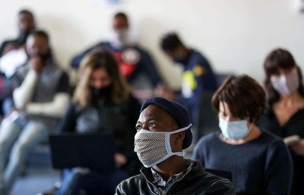 Vaccine trials' volunteers wait for their names to be called before testing for the coronavirus disease (COVID-19), and taking part of the country's human clinical trial for potential vaccines at the Wits RHI Shandukani Research Centre in Johannesburg, South Africa, August 27, 2020. Photo: Reuters