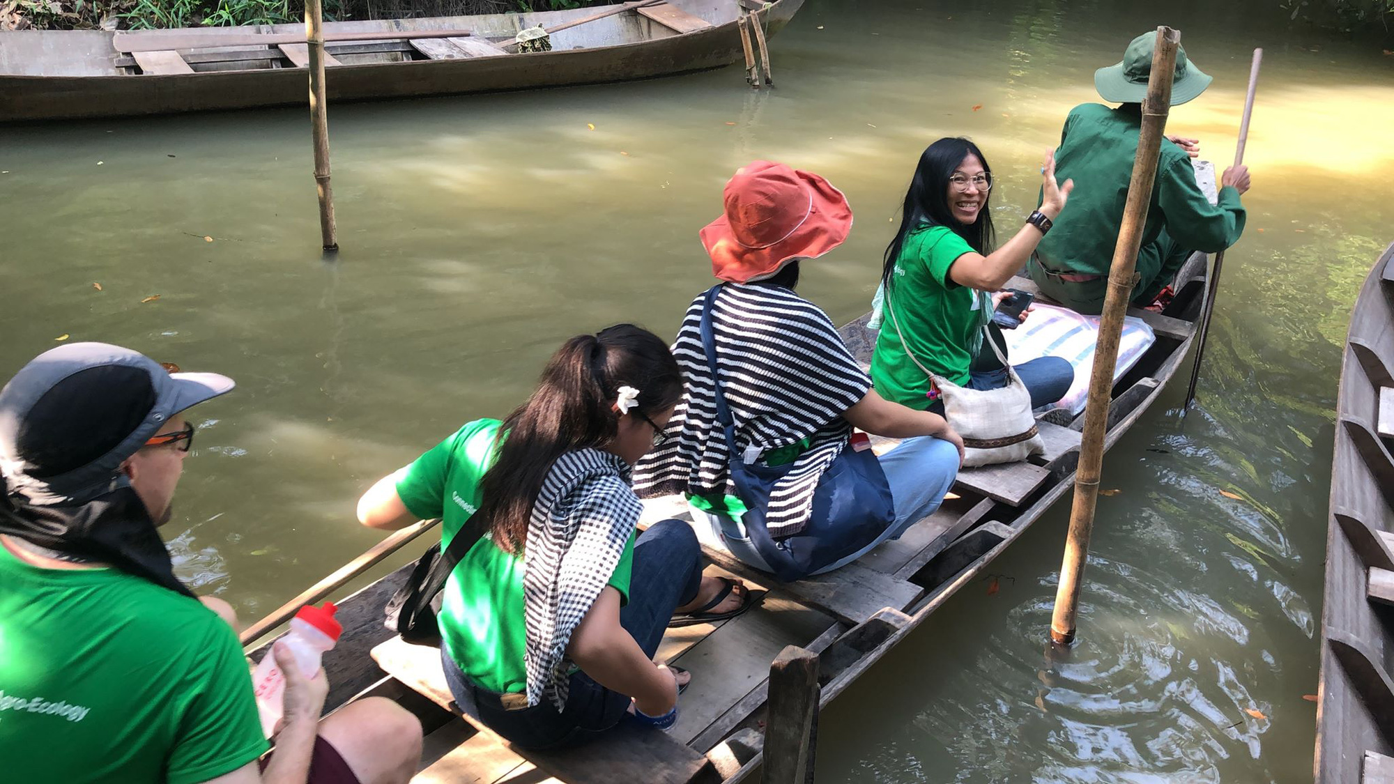Visitors experience canoeing on 'xuong ba la' (a type of row boat) at the Xeo Quyt Tourism Area in Dong Thap Province, Vietnam. Photo: Ly Quoc Dang / Tuoi Tre