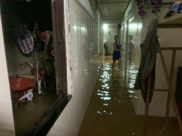 A house is flooded in this photo taken in Hoi An City on Sunday. Photo: B.D. / Tuoi Tre