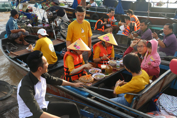 Iconic floating market in Vietnam’s Mekong Delta sees 15% yearly growth in visitors