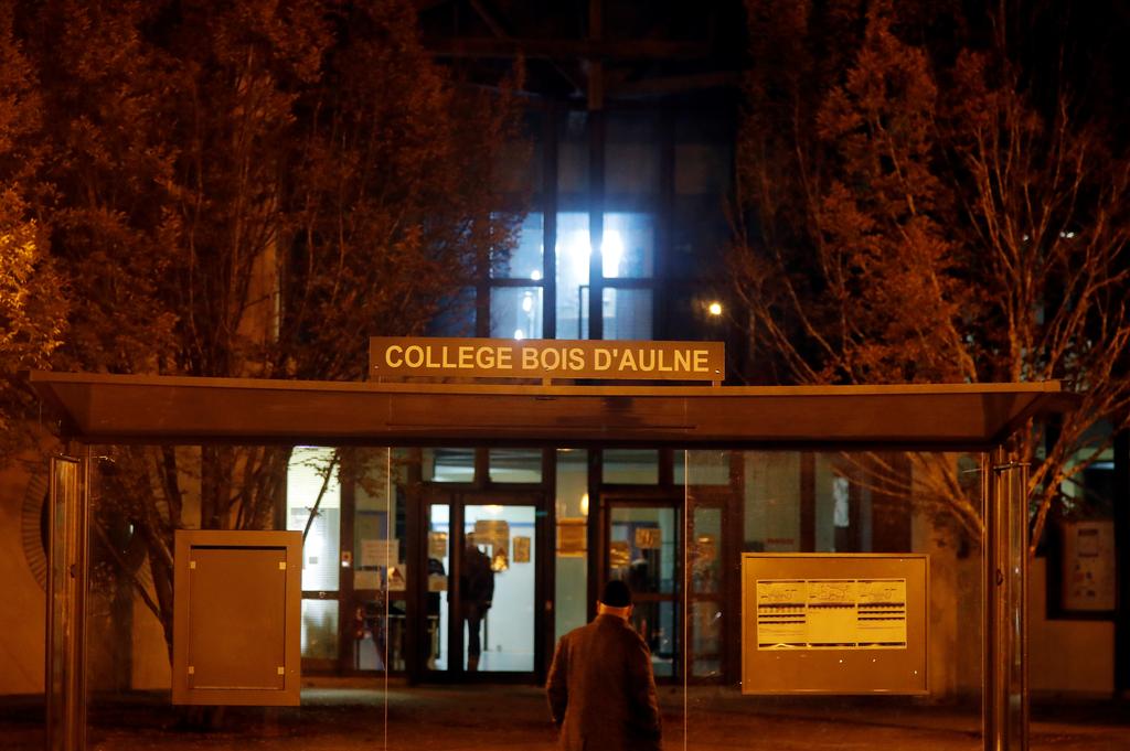 For a teacher in France, a civics class was followed by a gruesome death