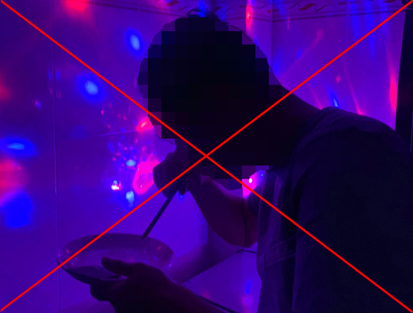 A drug user is seen inhaling ketamine inside a karaoke bar in Ho Chi Minh City. Photo: Tung Nguyen / Tuoi Tre