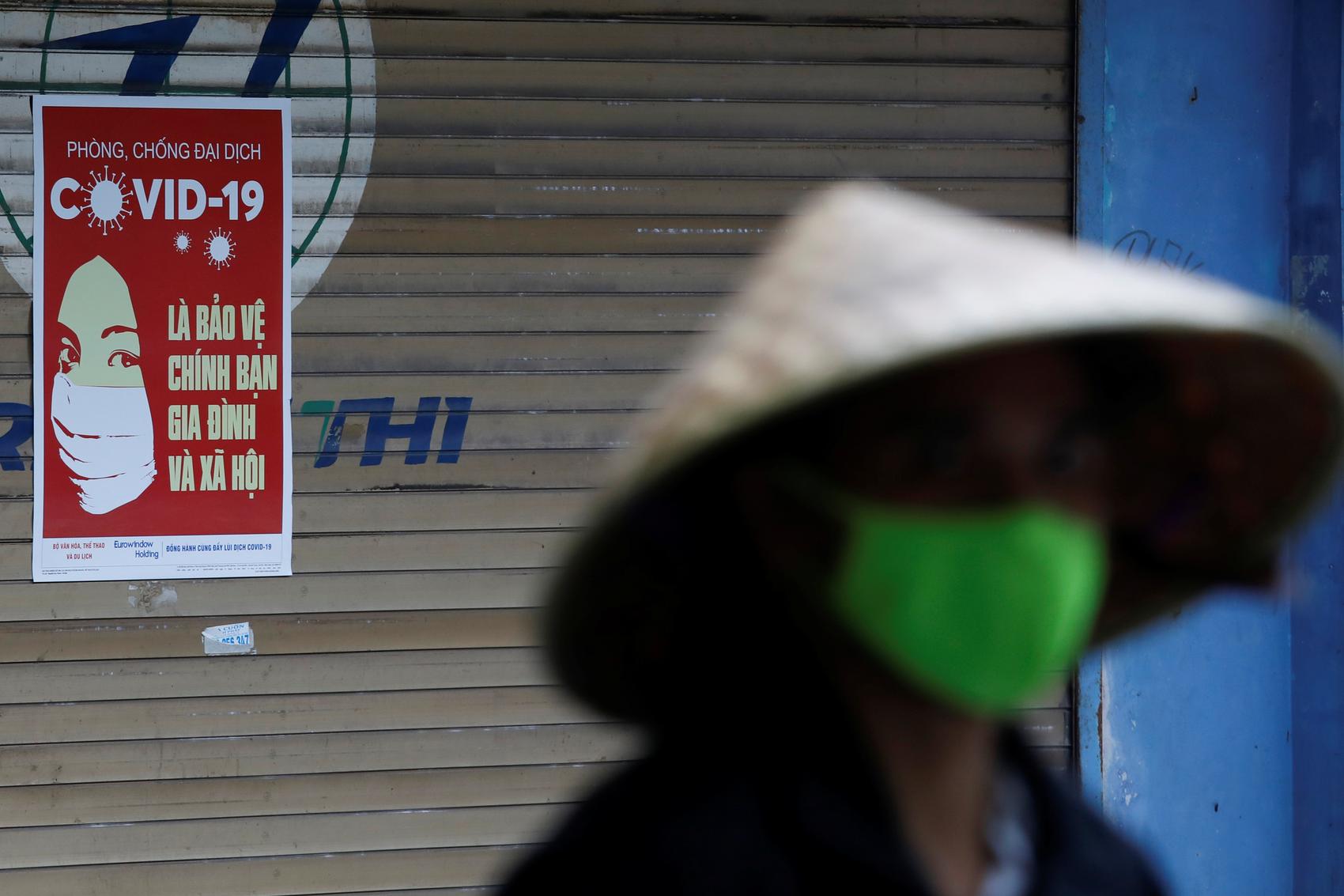 Vietnam opts for containment over ‘high risk’ rush for costly vaccine
