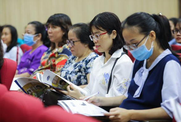 Ho Chi Minh City school representatives and education officials attend a training session