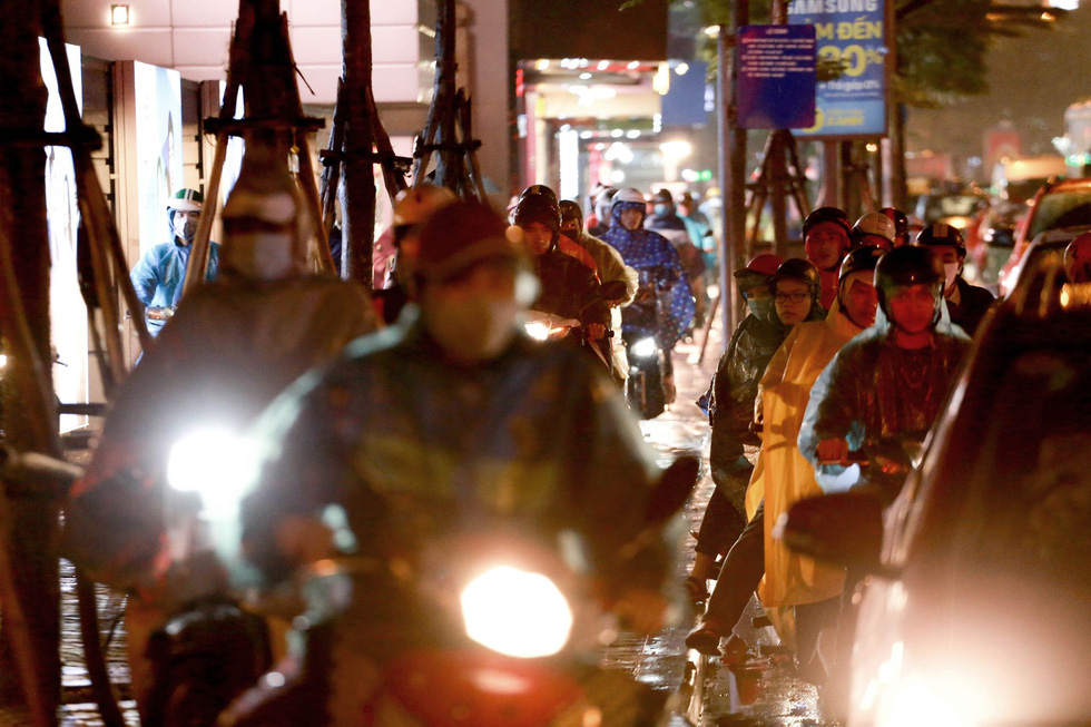Motorbikes run on the pavement of Hanoi’s Xa Dan Street. Photo: Chi Tue / Tuoi Tre