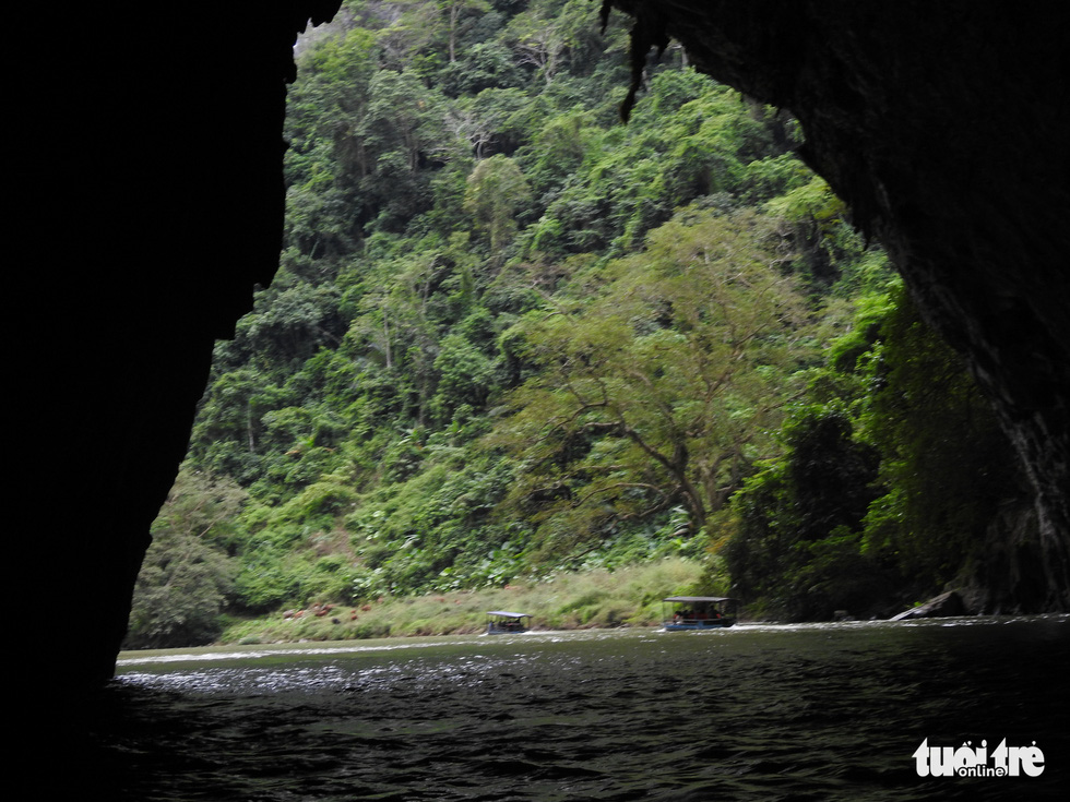 Boats travel through a cave in Bac Kan Province. Photo: T.Dieu / Tuoi Tre
