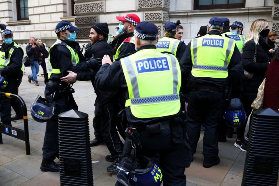 UK police arrest 155 in anti-lockdown protests in London