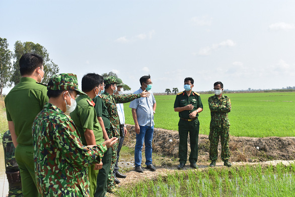 Vietnam’s border patrol keeps guard up against inbound COVID-19 risk