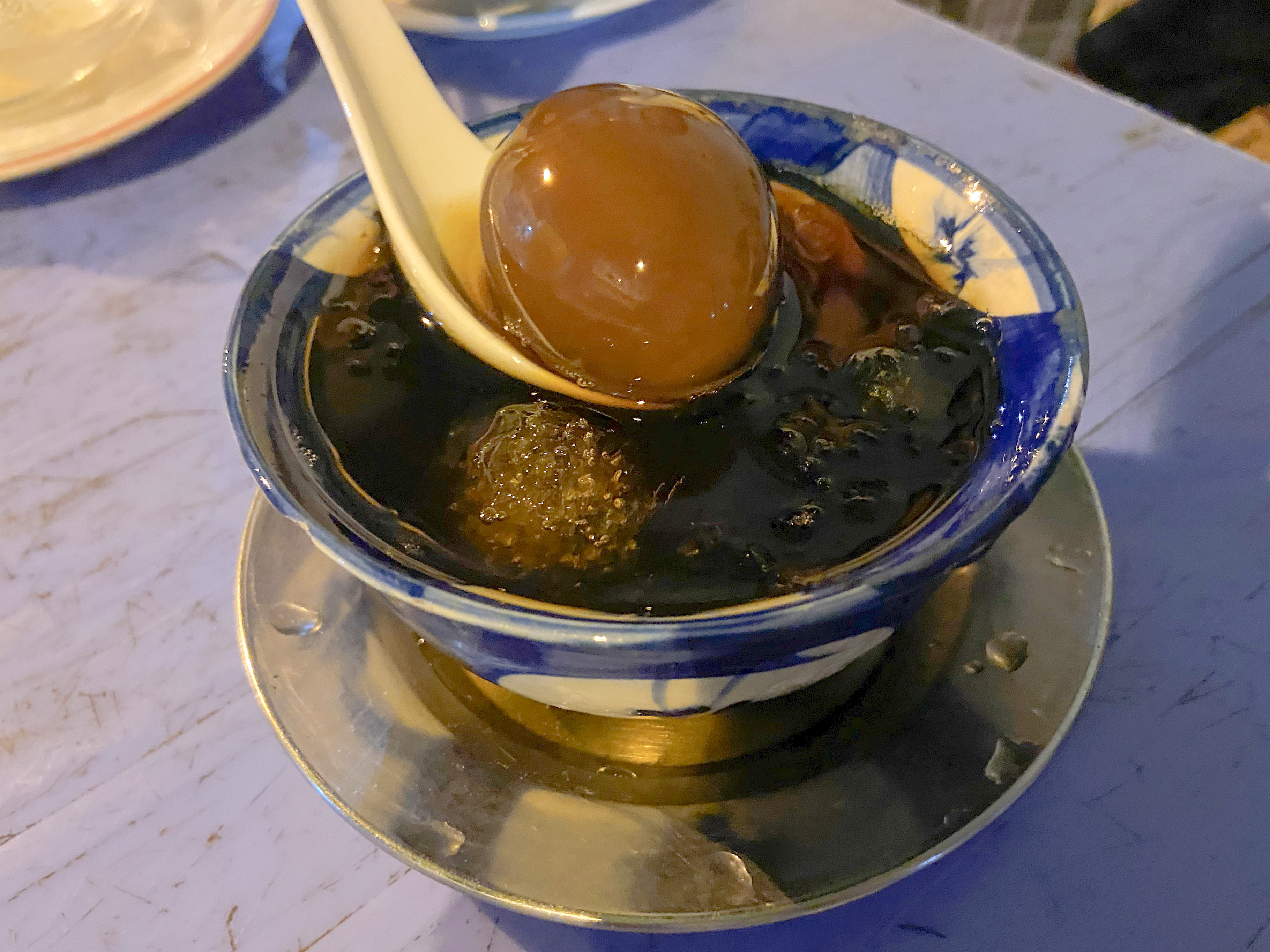 A serving of Chinese tea egg sweet soup from Chau Giang sweet dessert stall, Tran Hung Dao B Street, District 5, Ho Chi Minh City. Photo: Linh To / Tuoi Tre