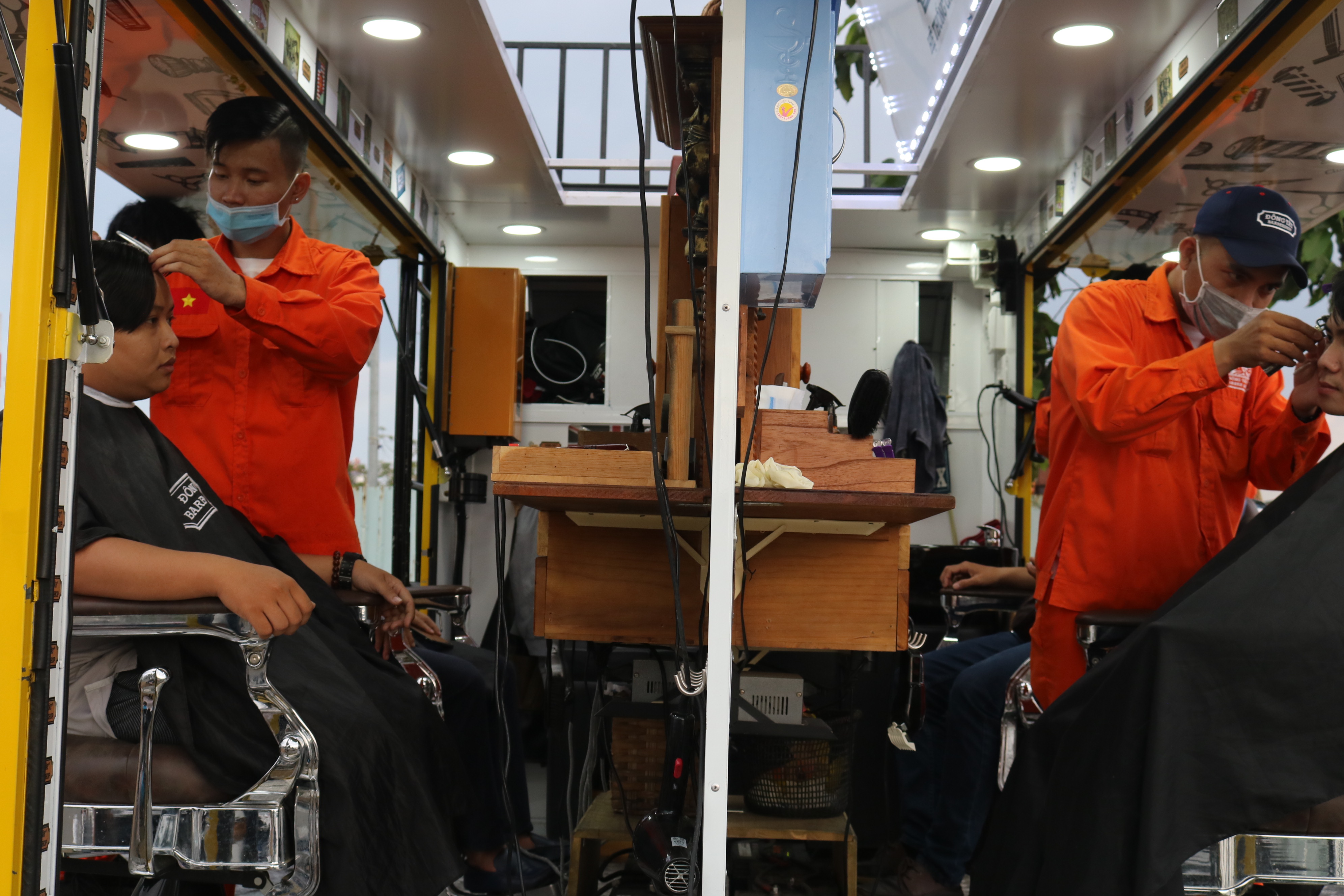 A close up to the mini hair salon of Dong Tay barber system at District 2, Ho Chi Minh City. Photo: Hoang An / Tuoi Tre