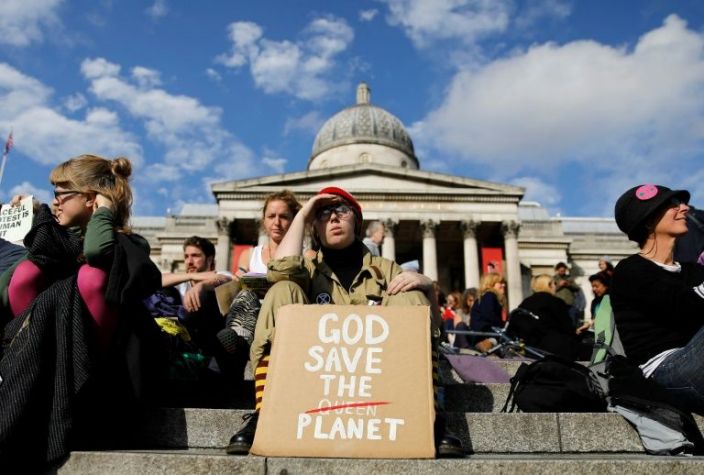 Activists protest at Trafalgar Square, during the ninth day of demonstrations by the climate change action group Extinction Rebellion, in London, on October 15, 2019. Photo: AFP