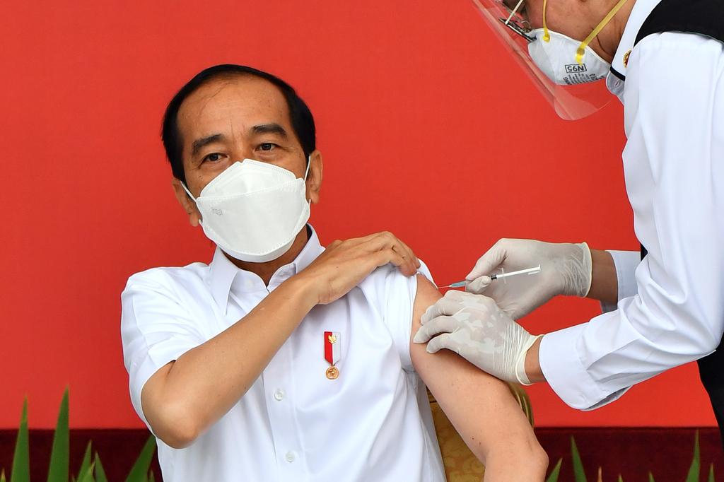 Indonesia launches vaccination drive as COVID-19 deaths hit record