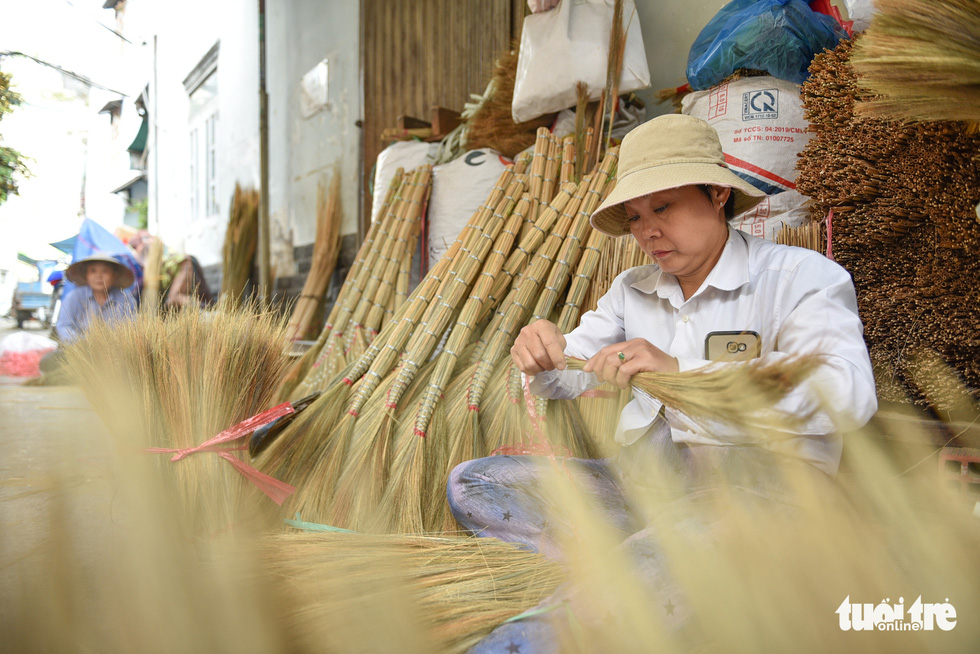 Hustle and bustle in a unique hamlet making brooms in Ho Chi Minh City