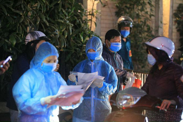 Local COVID-19 infections spread to 12 provinces, cities in Vietnam