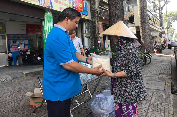 Ho Chi Minh City residents exchange recyclable trash for food, gifts