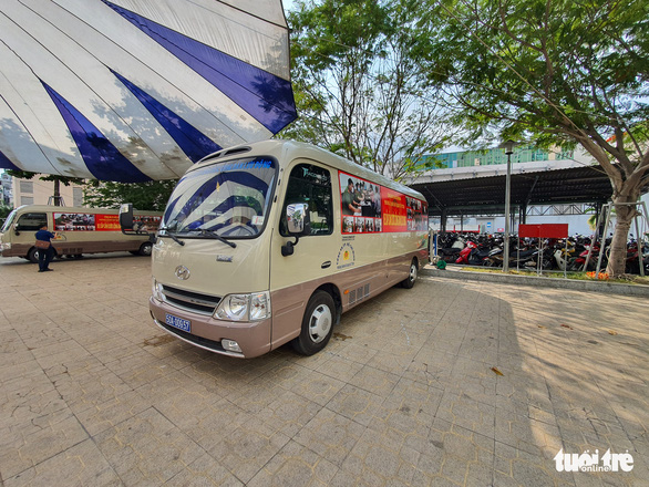 A travelling service booth, which brings registration of the new chip-based ID card to those in need, is seen in Ho Chi Minh City, March 18, 2021. Photo: Minh Hoa / Tuoi Tre