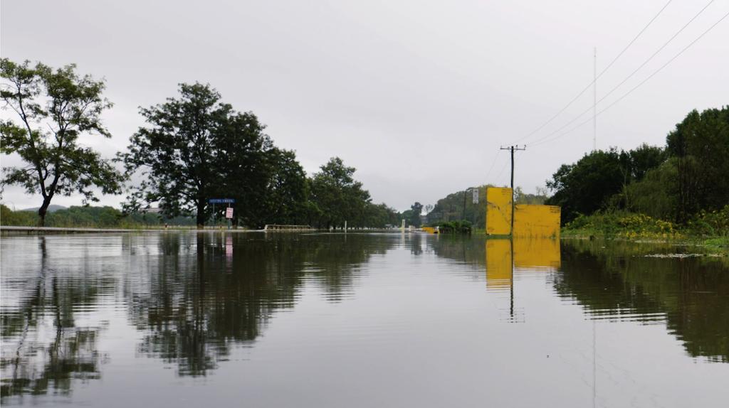 A still image taken from video shows a flooded area following heavy rains in Taree, New South Wales, Australia March 20, 2021. Photo: NSW State Emergency Service/via Reuters