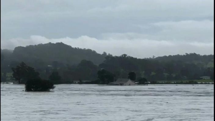 An inundated barn is seen in the floodwaters in the residential area of Richmond suburb on March 22, 2021, as Sydney braced for its worst flooding in decades after record rainfall caused its largest dam to overflow and as deluges prompted mandatory mass evacuation orders along Australia's east coast. Photo: AFP