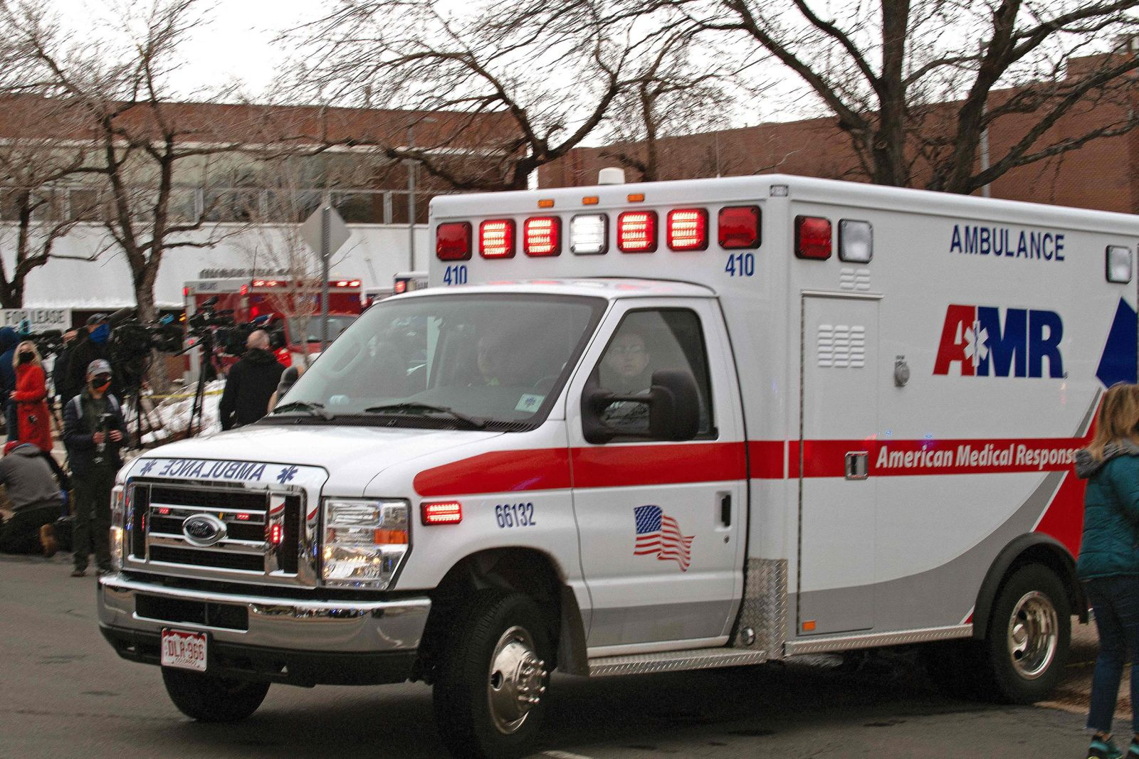 An ambulance leaves the parking lot of the King Soopers grocery store in Boulder, Colorado. Photo: AFP