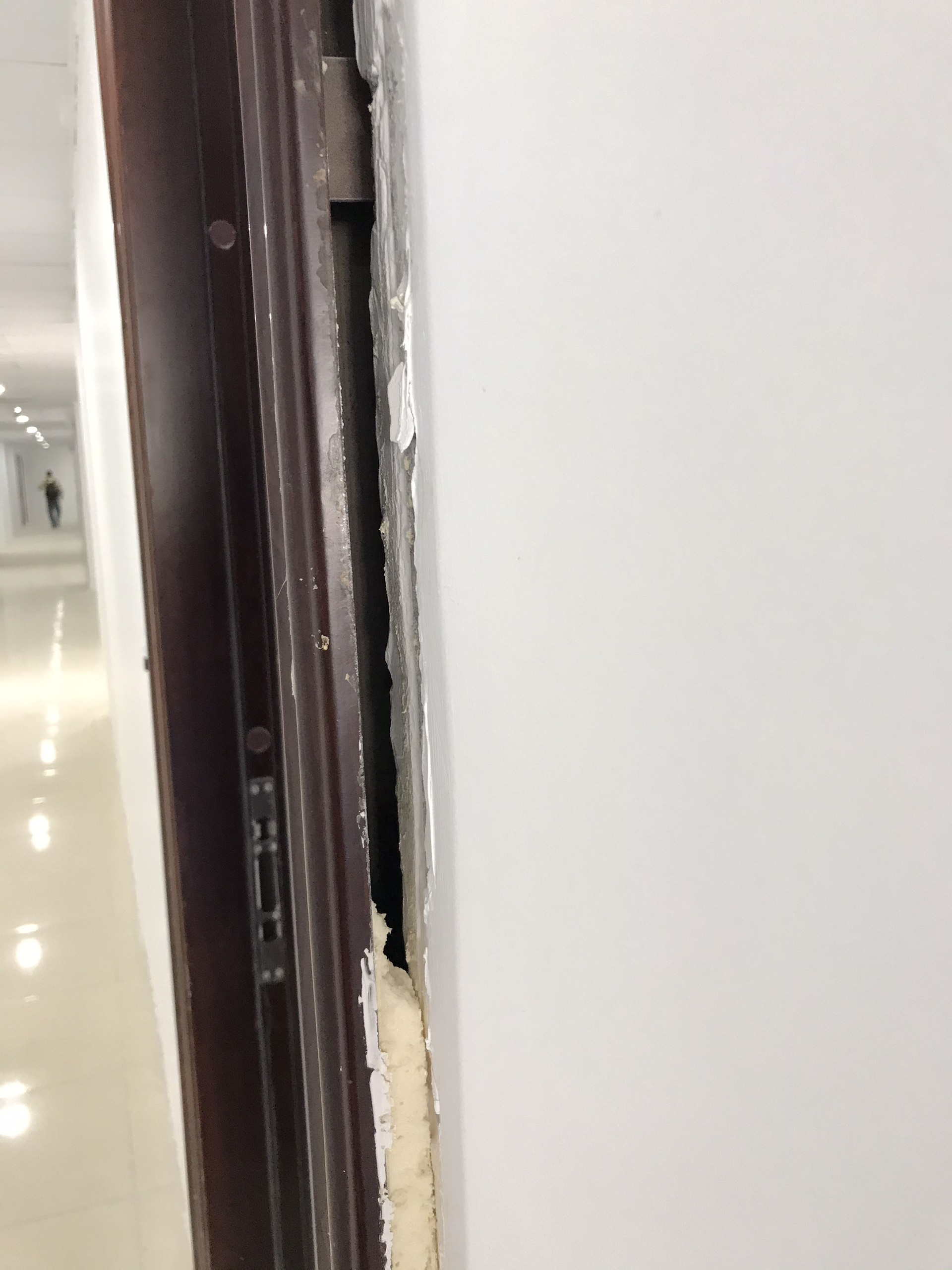 This supplied photo shows a door jamb peeling off at the P.H Nha Trang apartment complex in Nha Trang City, Khanh Hoa Province, Vietnam.