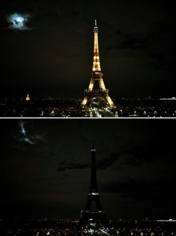 In Paris, the three stages of the Eiffel Tower progressively went dark but there were few people to watch with the whole country under a 7 pm Covid-19 curfew. Photo: AFP