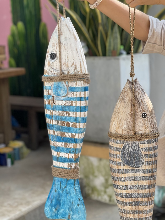 Artworks from driftwood made by Le Ngoc Thuan and associates in Hoi An City. Photo: B.D. / Tuoi Tre
