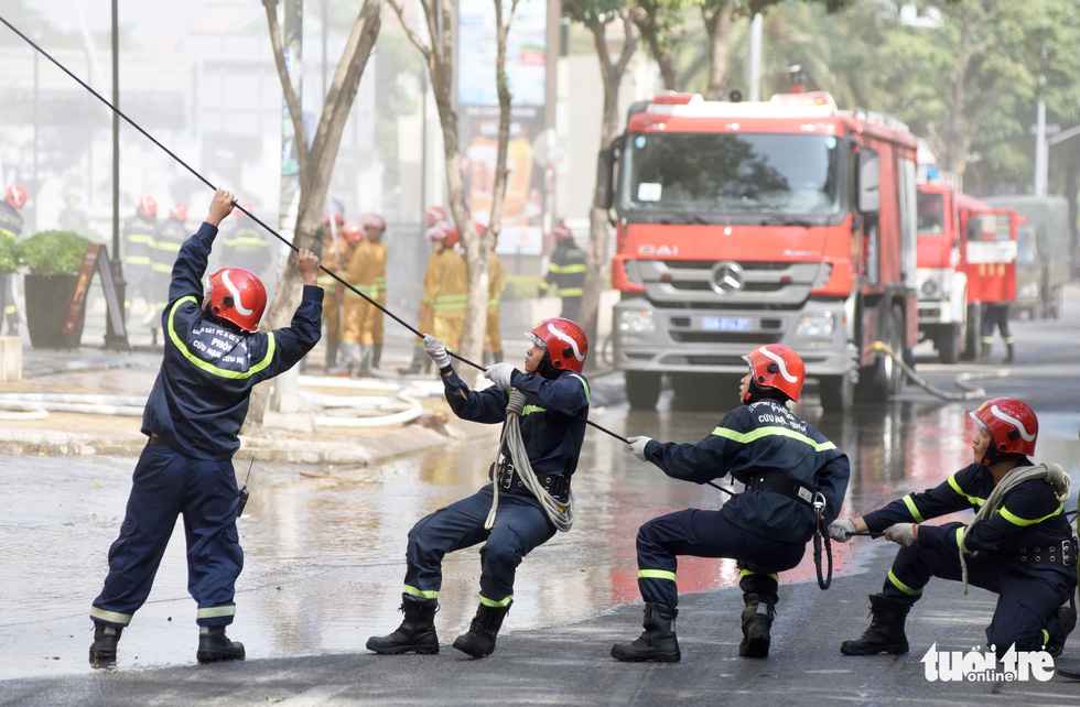 A firefighting and rescue drill takes place at an apartment building in District 8, Ho Chi Minh City.
