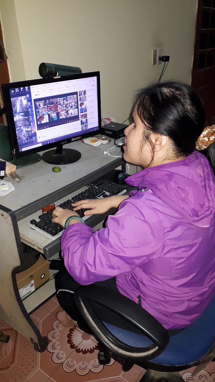 Khanh Van, a ScriVi member, joins a training session via Zoom in this supplied photo.