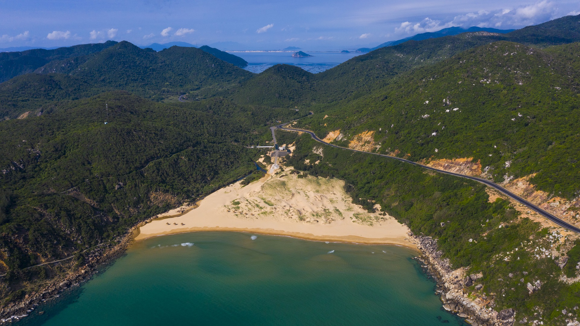 A road through mountains and sea in the central province of Phu Yen seen from above. Photo: Quang Dinh / Tuoi Tre News